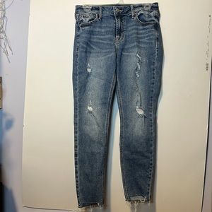 Brand New distressed mid-rise rockstar super skinny Old Navy jeans (size 4).